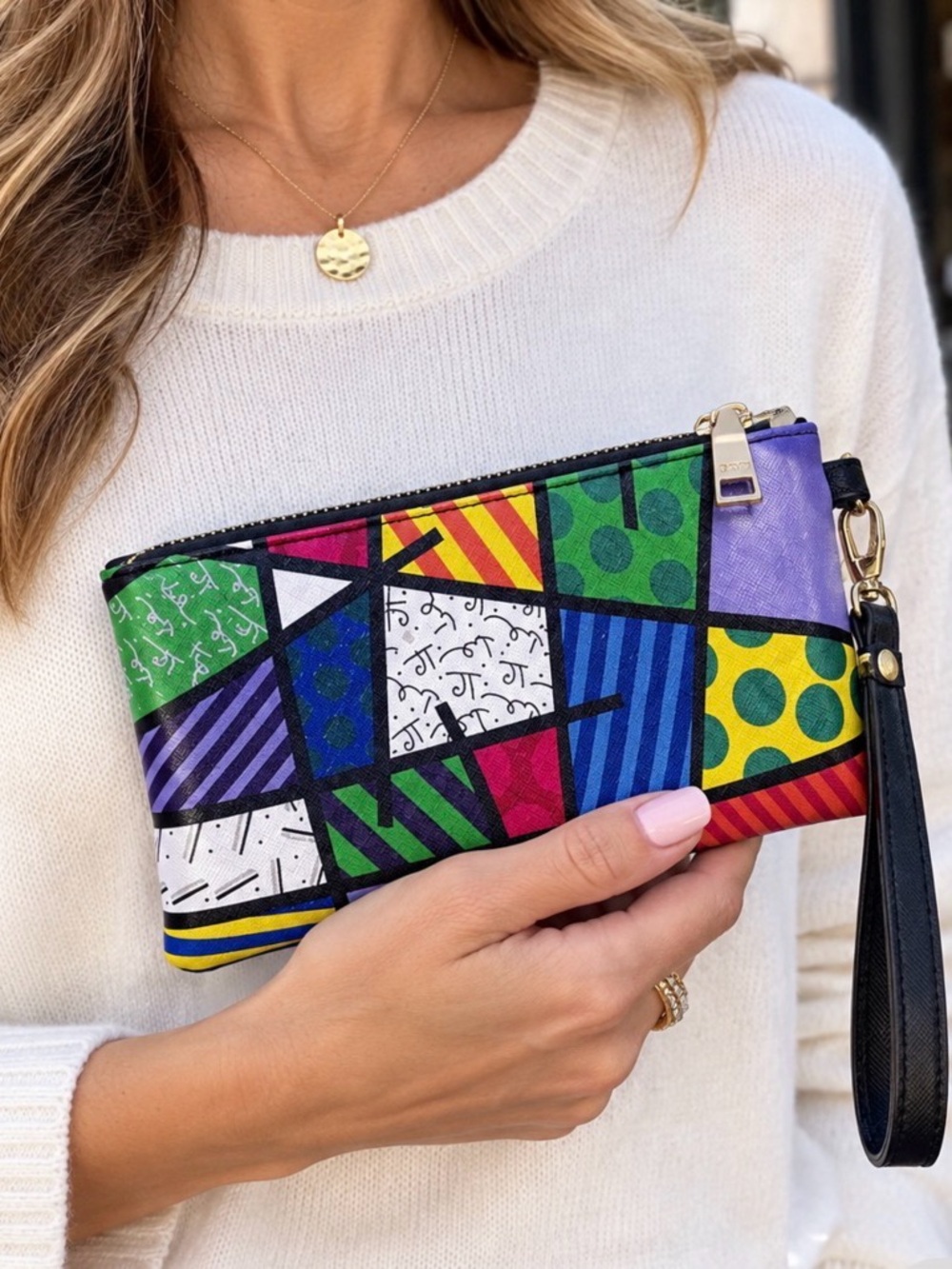 Brito Romero wristlet EUC